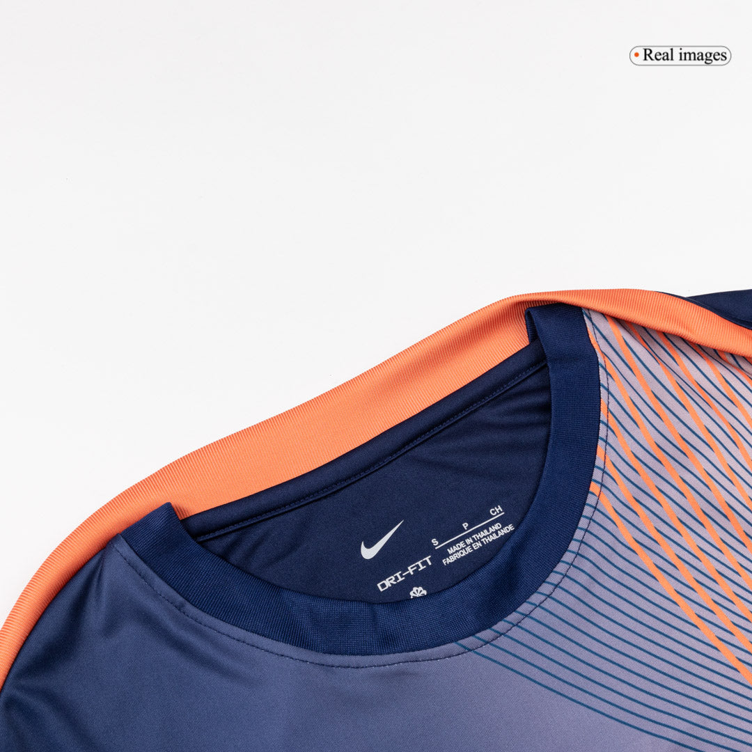 Barcelona Oppvarmingsdrakt 2025/26 (Oransje)